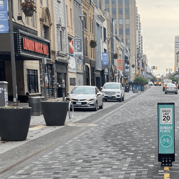 Dundas Street with a 20 km/h sign in the center line
